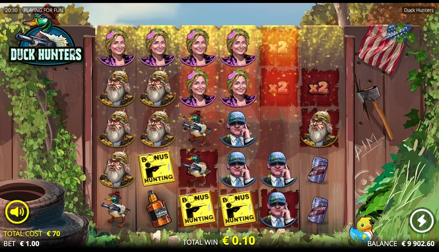 Duck Hunters base game mid-cascade with a winning cluster, x2 position-multiplier cells and three Bonus Hunting scatters on the grid